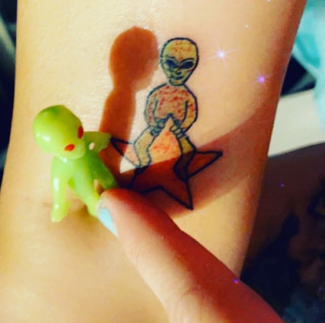 Alien & alien tattoo π½